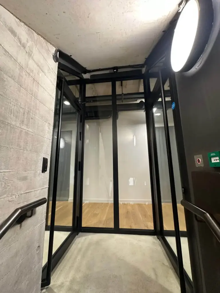 Thermal break in steel flame door for improved insulation